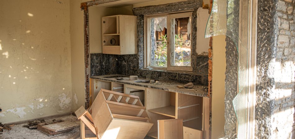 Abandoned home with demoed kitchen.